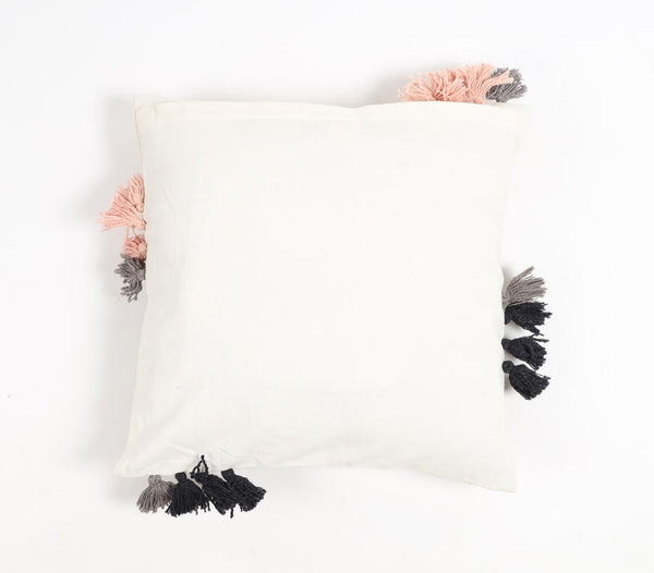 Embroidered cotton geometric tasseled cushion | Coussin géométrique brodé en coton