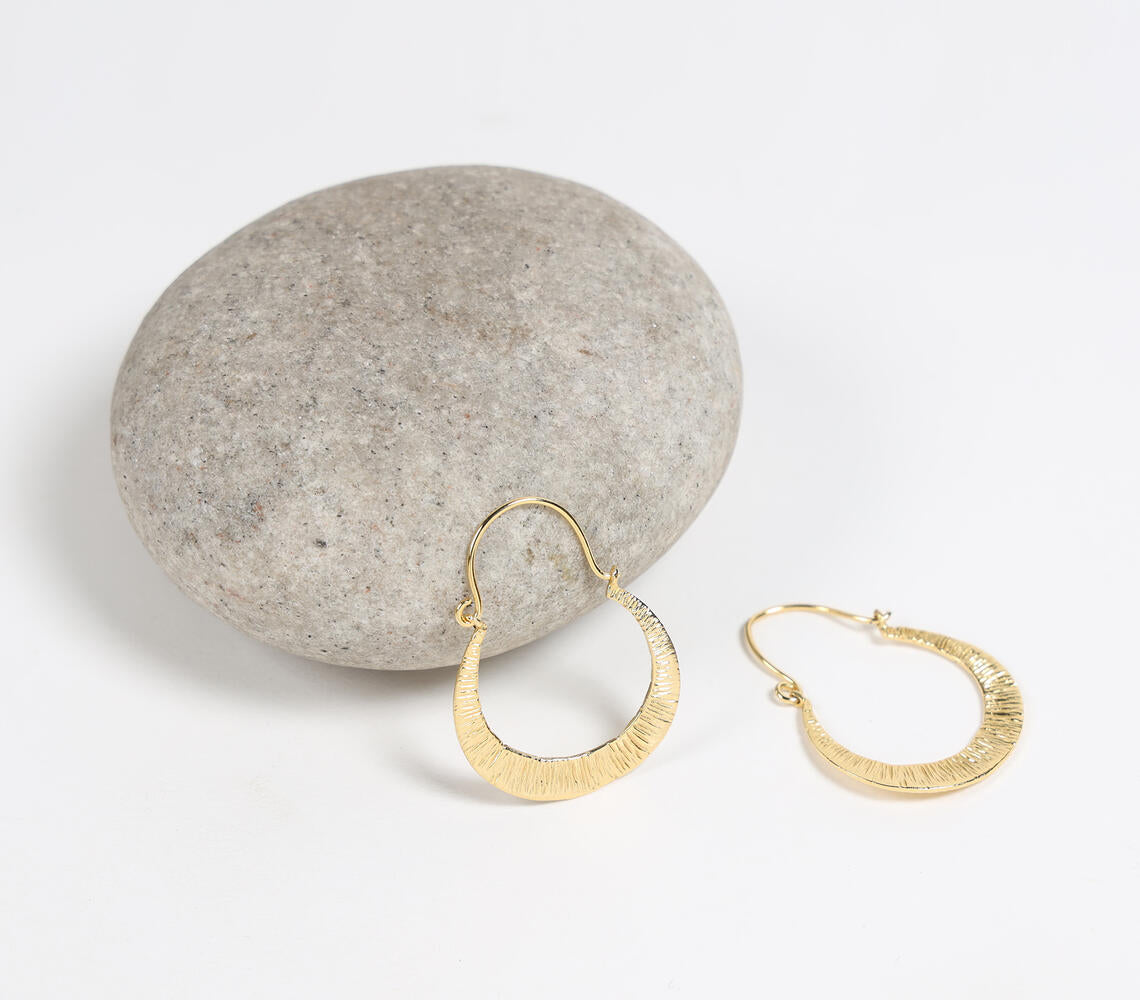 Gold-toned recycled brass crescent hoop earrings | Boucles d'oreilles en forme de croissant en laiton recyclé doré